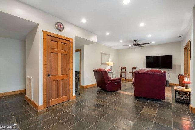 living room with recessed lighting, visible vents, ceiling fan, and baseboards