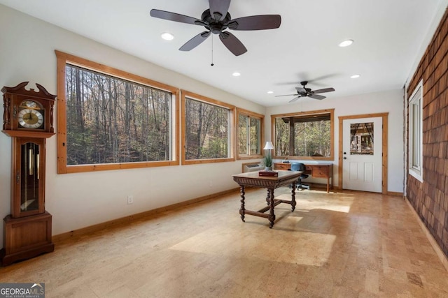 office with recessed lighting and baseboards