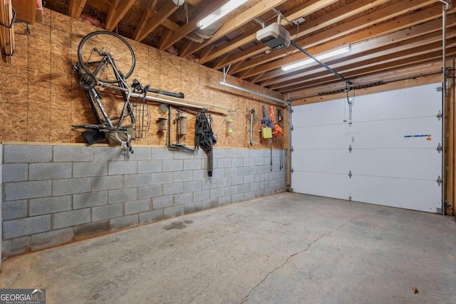 garage featuring a garage door opener