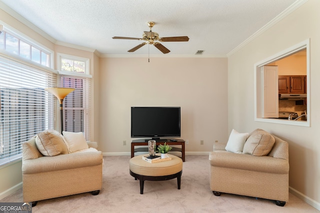 living room with carpet, visible vents, and baseboards