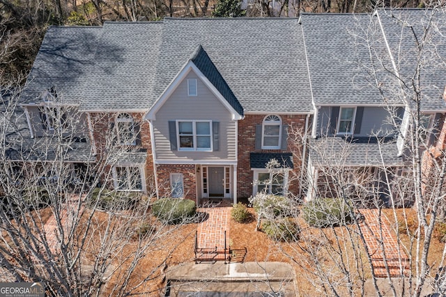 view of front of house with brick siding