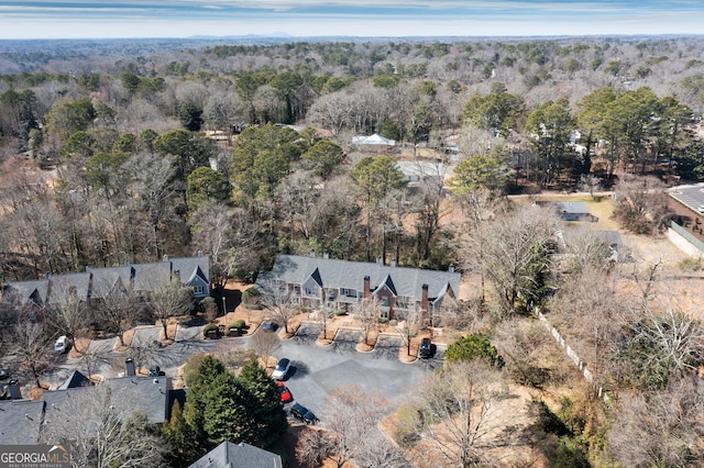 drone / aerial view with a forest view