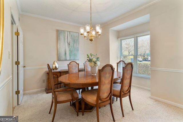 dining room featuring ornamental molding, light colored carpet, baseboards, and an inviting chandelier