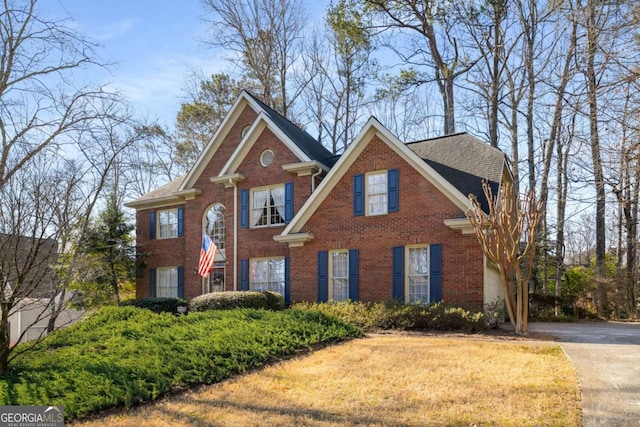 view of front facade featuring brick siding