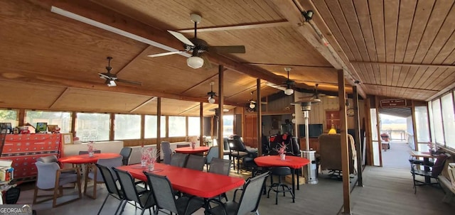 dining room featuring vaulted ceiling with beams, ceiling fan, and wood ceiling