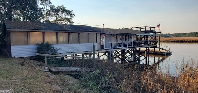 dock area featuring a water view