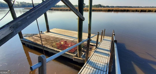 view of dock featuring a water view