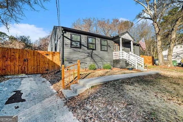 view of front of home with fence