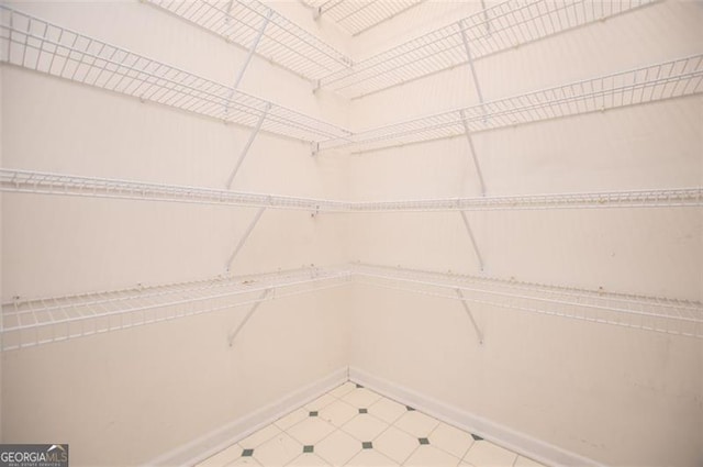 walk in closet featuring tile patterned floors