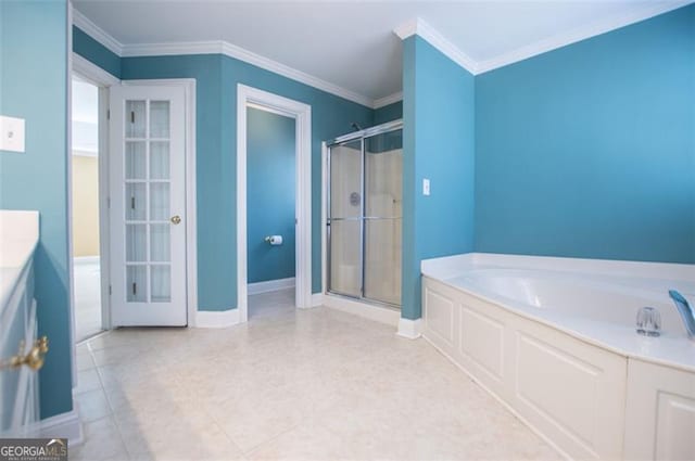 bathroom featuring a stall shower, crown molding, vanity, and a bath