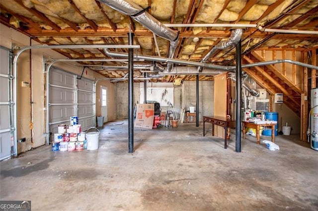 garage featuring water heater