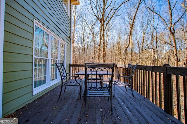 deck featuring outdoor dining space