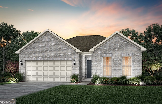 single story home featuring a front yard, concrete driveway, brick siding, and an attached garage