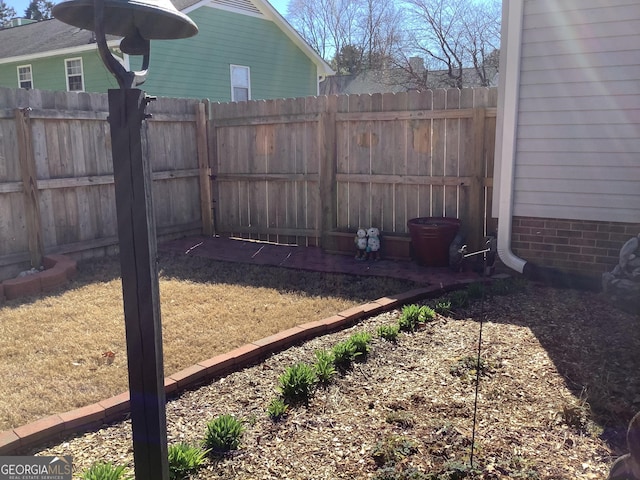 view of yard with fence