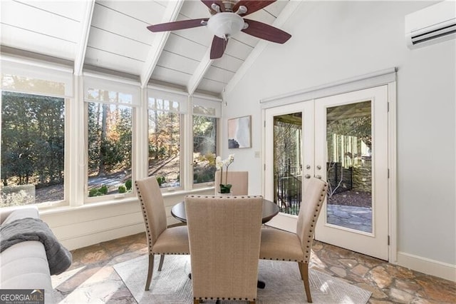 sunroom with french doors, vaulted ceiling with beams, wood ceiling, ceiling fan, and a wall mounted air conditioner