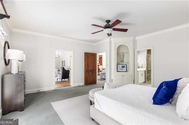 bedroom featuring crown molding, light colored carpet, a ceiling fan, connected bathroom, and baseboards