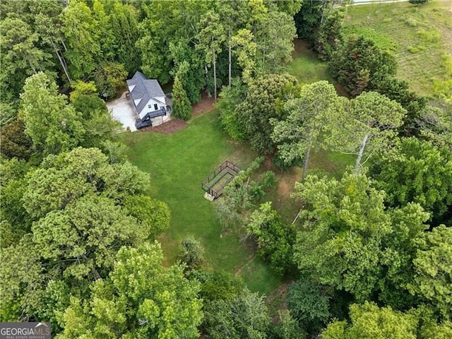 bird's eye view with a forest view