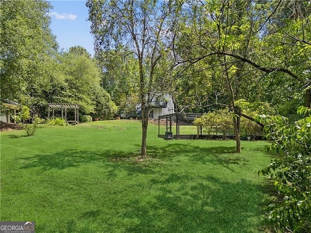 view of yard with a pergola