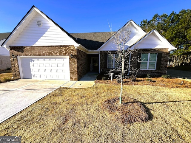 ranch-style home with an attached garage, driveway, and brick siding