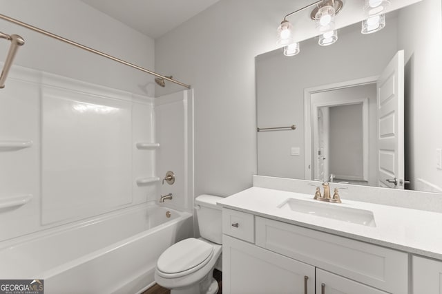 full bath featuring toilet, washtub / shower combination, and vanity