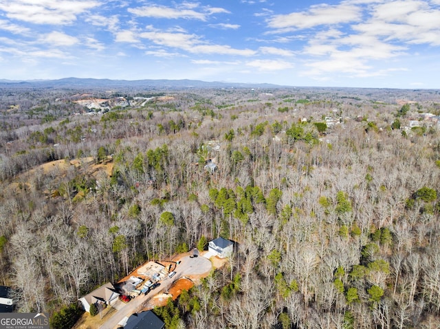 aerial view featuring a forest view