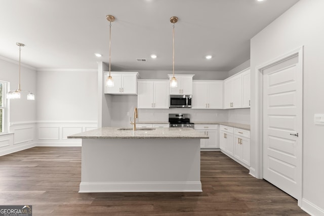 kitchen featuring appliances with stainless steel finishes, dark wood-type flooring, a sink, and visible vents