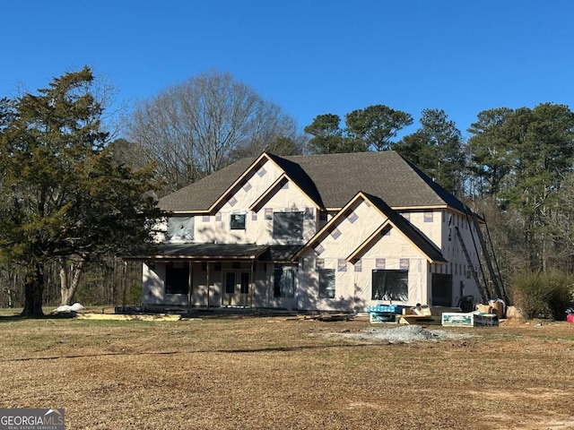 property in mid-construction with a front yard