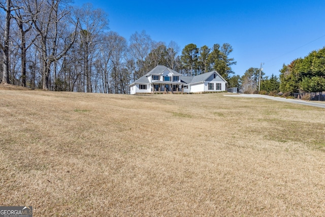 view of front of property with a front lawn