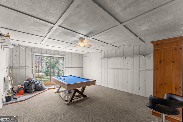 recreation room featuring coffered ceiling, ceiling fan, pool table, carpet floors, and wood walls