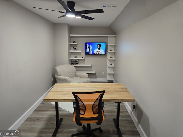 office space featuring ceiling fan, wood finished floors, visible vents, and baseboards