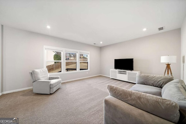 living room with baseboards, visible vents, carpet flooring, and recessed lighting