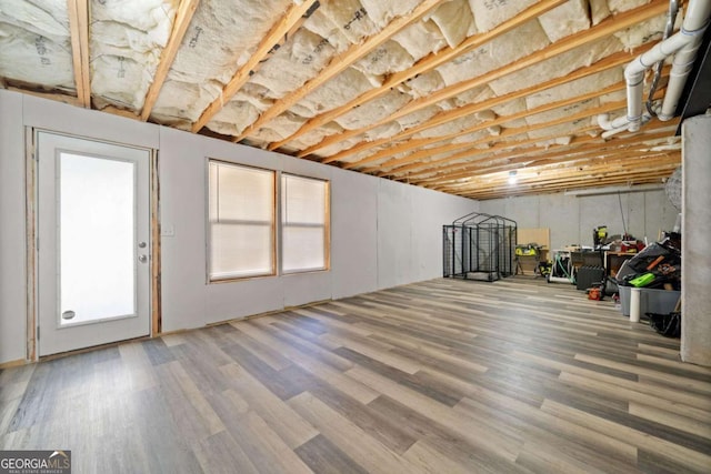 below grade area featuring wood finished floors