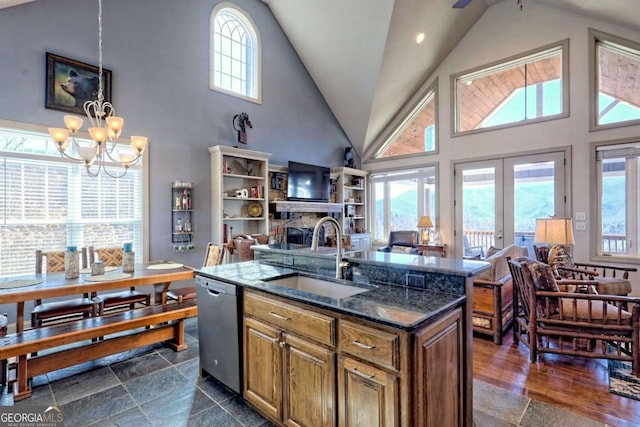 537 Mill Ridge Rd, Hiawassee, GA 30546 - kitchen featuring open floor plan, stainless steel dishwasher, a sink, and a kitchen island with sink