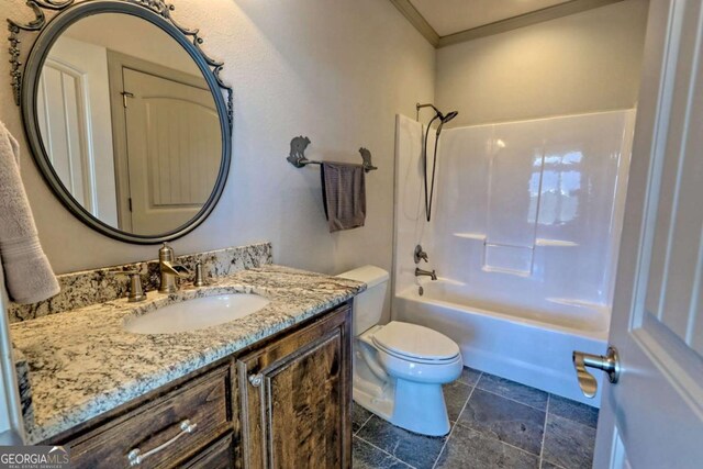 537 Mill Ridge Rd, Hiawassee, GA 30546 - bathroom with crown molding, toilet, stone finish flooring, vanity, and shower / tub combination