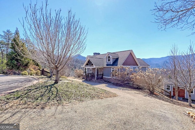 537 Mill Ridge Rd, Hiawassee, GA 30546 - view of front of house featuring driveway, a chimney, and a mountain view