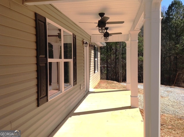 view of patio featuring a ceiling fan