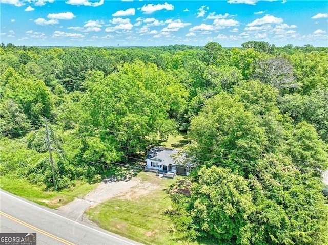 bird's eye view with a view of trees