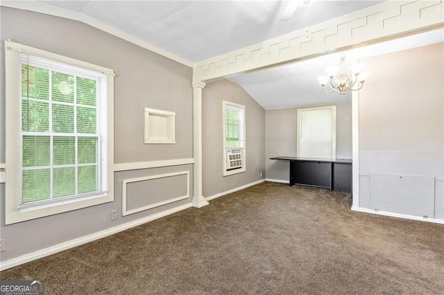 carpeted empty room with plenty of natural light, vaulted ceiling, and a notable chandelier