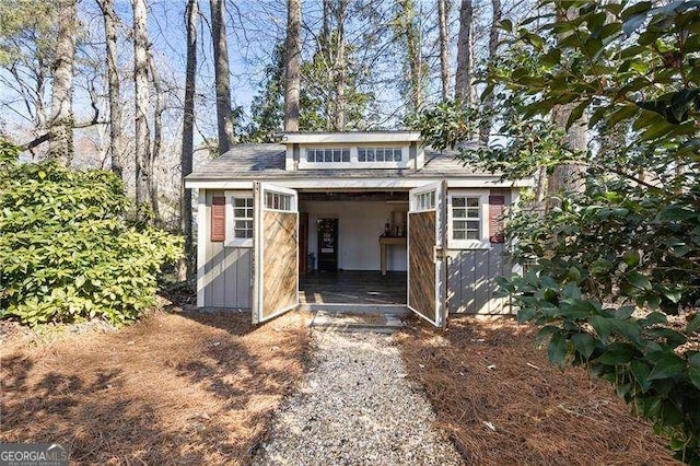 view of outbuilding with an outbuilding