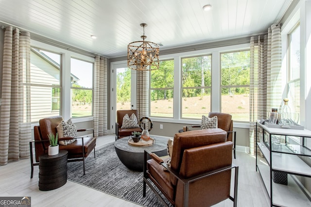 sunroom / solarium featuring wooden ceiling and an inviting chandelier