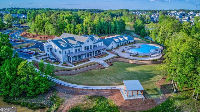 aerial view featuring a view of trees