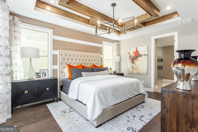 bedroom featuring coffered ceiling, visible vents, baseboards, beam ceiling, and dark wood finished floors