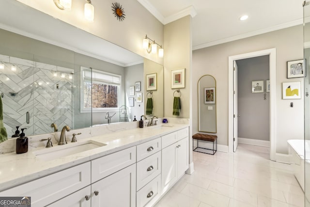 bathroom featuring ornamental molding, a stall shower, and a sink