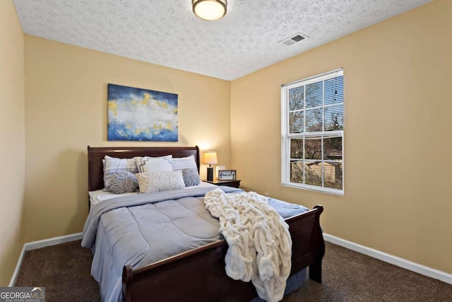 bedroom featuring carpet, visible vents, and baseboards