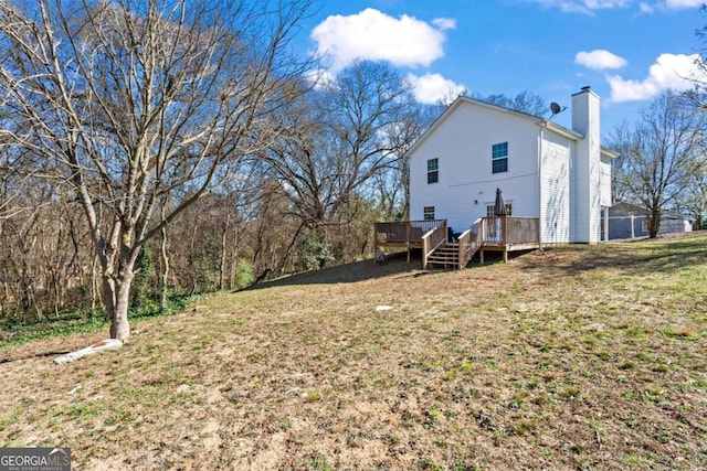 view of yard with a deck