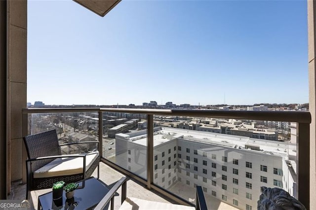 balcony featuring a city view