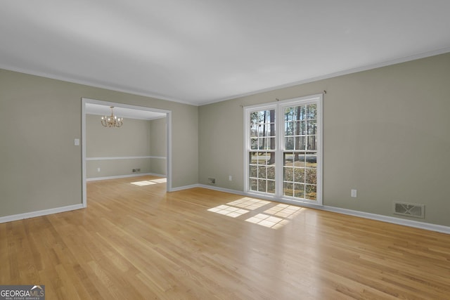 interior space with light wood finished floors, baseboards, visible vents, crown molding, and a notable chandelier