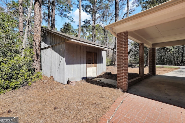 exterior space featuring an outbuilding