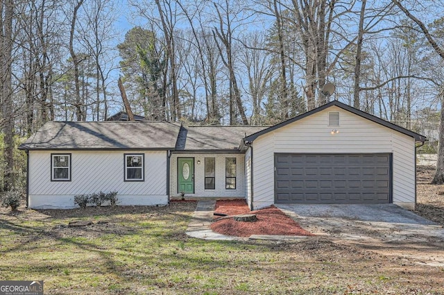 ranch-style home with a garage, driveway, and covered porch