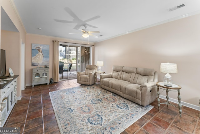 living room with baseboards, ceiling fan, visible vents, and crown molding